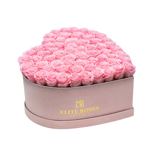 Pink roses in a large heart box