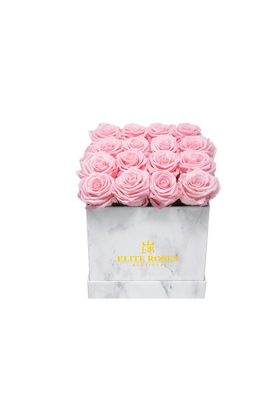 Pink roses in a medium square box