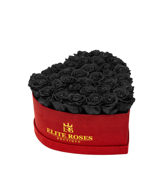 Black roses in a medium heart box