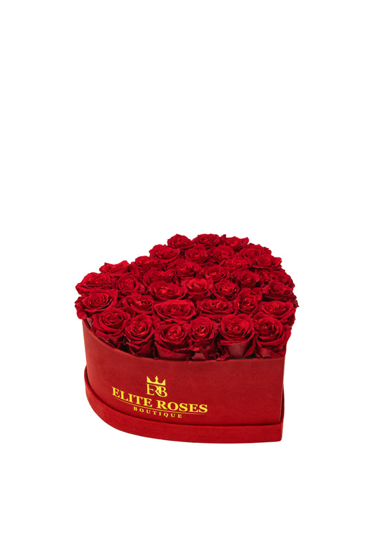 Red roses in a medium heart box